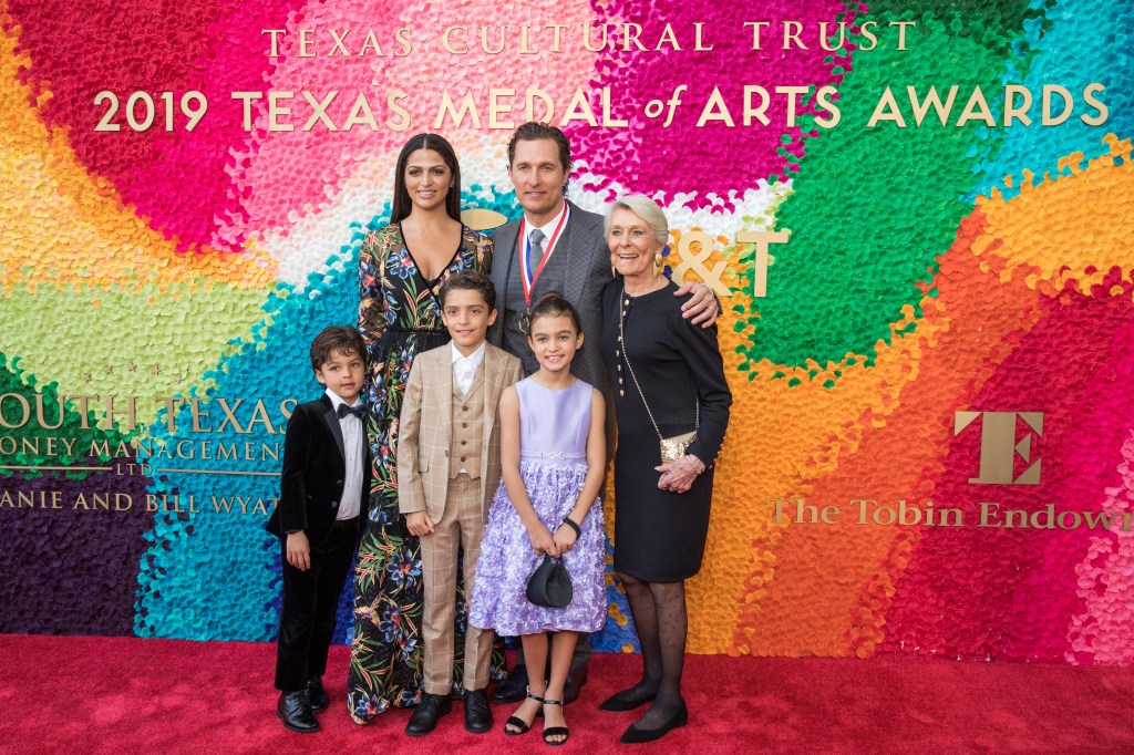 Matthew McConaughey and Camila Alves with her kids Levi, Vida and Livingston