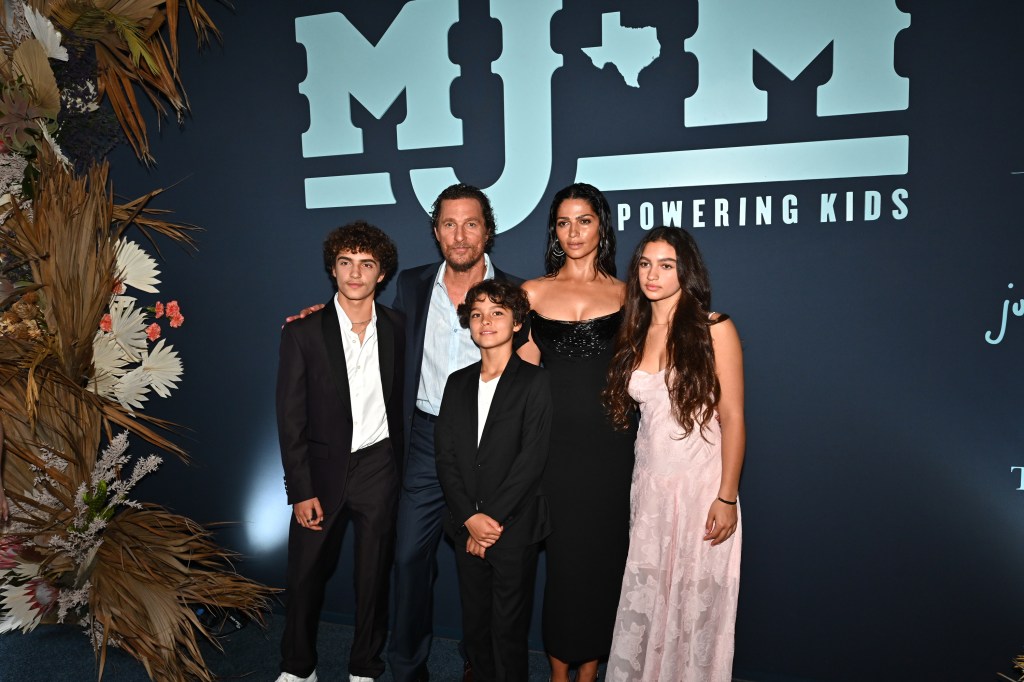 Matthew McConaughey and Camila Alves with her kids Levi, Vida and Livingston